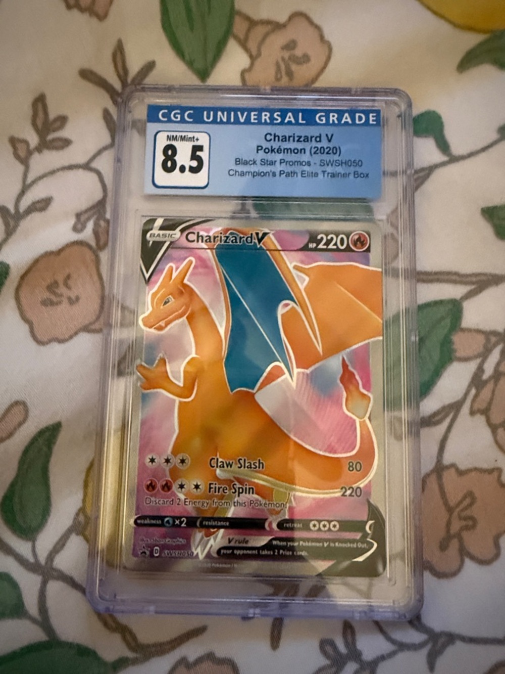 Pokemon Graded Card with Blue Back and Red Poké Ball Accent